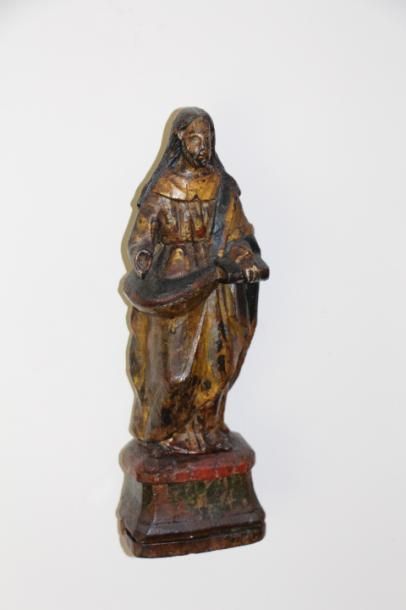 null Christ en bois polychrome et or Travail étranger Haut : 27cm On joint une statuette...