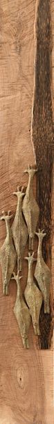 null LA VARANDE Marie (XXe-XXIe siècle) Six girafes Bronze sur bois. Hauteur : 64...