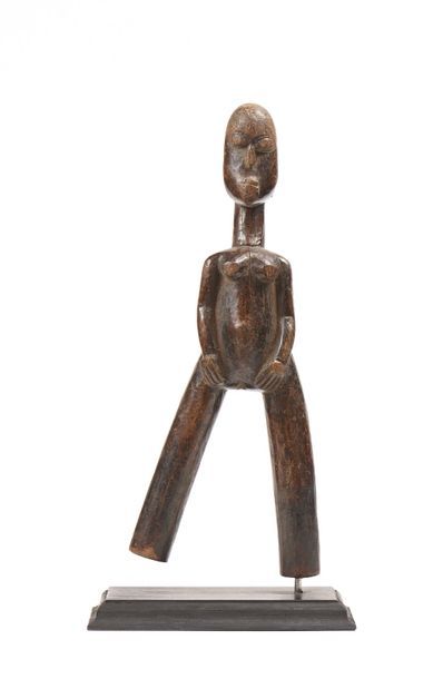 null Lance pierre Baoulé, côte d’Ivoire : représentant un personnage, en bois, H...