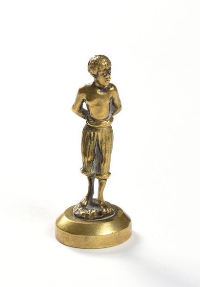 null 285 Petit sujet en bronze doré représentant un esclave. Hauteur : 7 cm 
