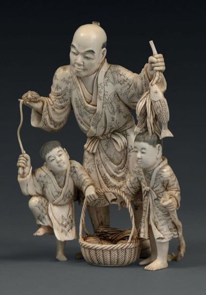 null Okimono en ivoire pêcheur et ses enfants.
Japon XIXème siècle.
Signé
Hauteur:...