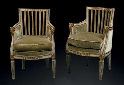 null Suite de deux canapés et deux fauteuils en bois peint et doré, à dossier ajouré...