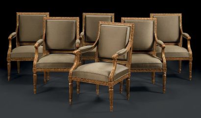 null Suite de six fauteuils en bois doré à dossier plat, à décor de jonc rubané et...