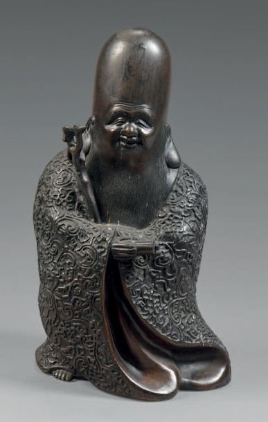 CHINE Sage et sa canne en bronze à patine brune.
XIXe siècle.
Hauteur: 23 cm