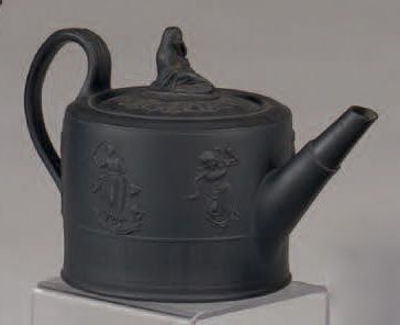 null Set in black tinted ceramic, known as black basalt, comprising: a large teapot...