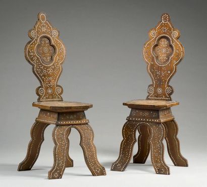 null Pair of high chairs in natural wood and bone inlays.
Venetian work at the end...