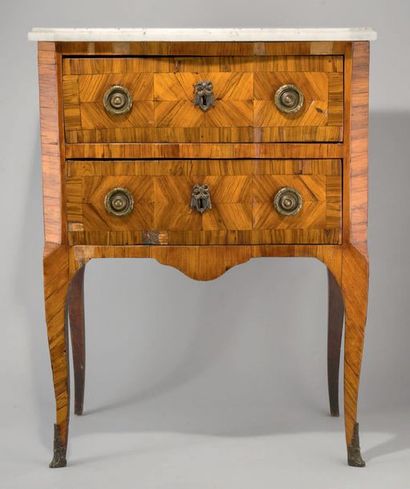 null Small chest of drawers with a light central rosewood veneer overhang in net...