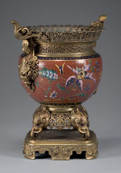 null *Rare circular planter composed of a polychrome enamel bowl decorated with flowers...