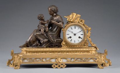 null Gilt bronze, bronze with brown patina and white marble mantel clock, representing...