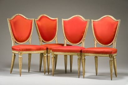 null Suite of four chairs with crest backrest in cream and gold lacquered wood, sheathed...
