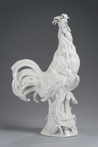 VIENNE *Important white porcelain group representing a rooster standing on ears of...