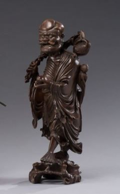 null CHINE
Ebisu, Dieu de la Prospérité en bois exotique sculpté représenté debout...