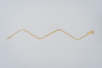 Petit bracelet en or jaune (750/1000). Poids...