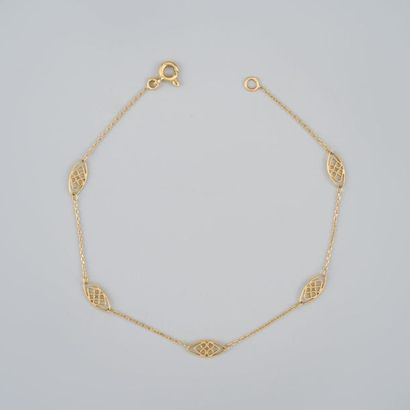 Petit bracelet en or jaune (750/1000) composé...