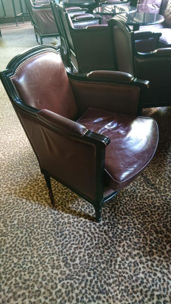 null Pair of brown leather club armchairs, blackened wood.
Louis XVI style.
H : 84...