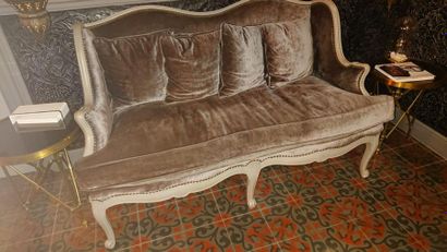 null Sofa with blue lacquered wood ears, arched legs.
Louis XV style.
Upholstered...