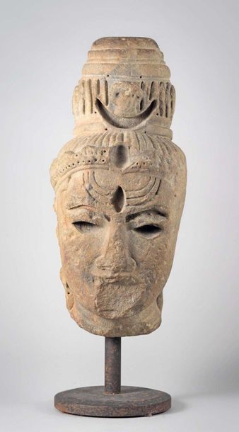 null Carved stoneware Shiva head
Vietnam, Champa art, 11th century.
The hair brought...