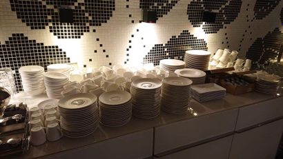 null Set of white crockery basketry patterns comprising bowls tea cups coffee cups...