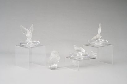 null LALIQUE France: Set of three moulded glass ashtrays pressed bird-shaped holds....
