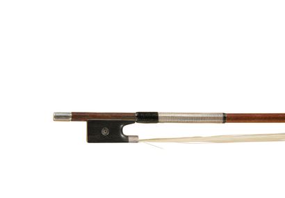 null 
F.N. Voirin violin bow with iron mark. Silver ebony frog with thumb rest and...