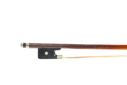 null 31. Violin bow from the school of Simon FR. Round stick in pernambuco wood....