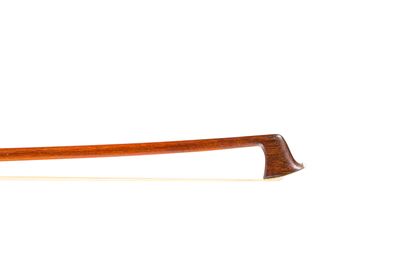 null 31. Violin bow from the school of Simon FR. Round stick in pernambuco wood....