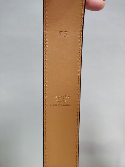 null 
A HERMES Paris caramel leather belt.

Size 75.

Light stain and stripe
