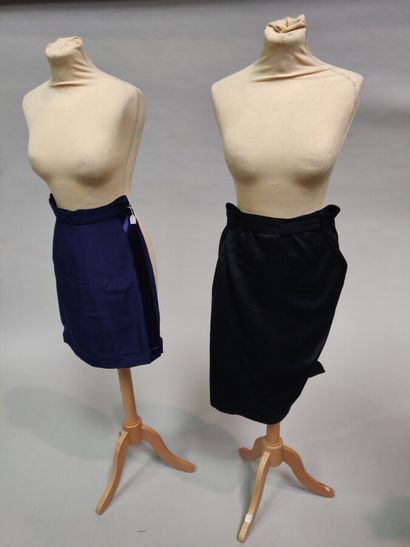 Set of two skirts and one pair of pants including:...
