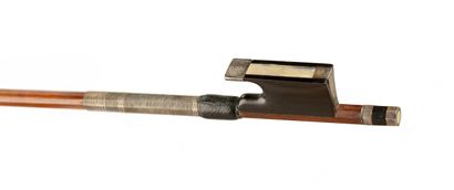 null 
Rare violin bow by Pierre SIMON circa 1860, mounted with its frog and interchangeable...