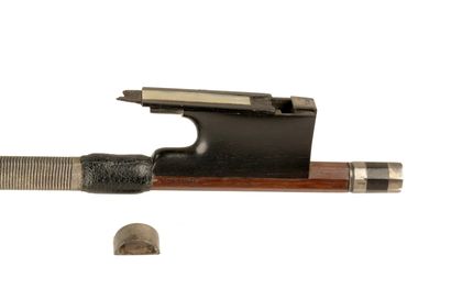 null 
Rare violin bow by Pierre SIMON circa 1860, mounted with its frog and interchangeable...