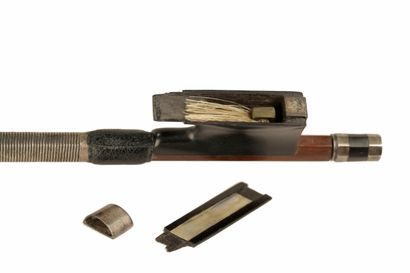 null 
Rare violin bow by Pierre SIMON circa 1860, mounted with its frog and interchangeable...