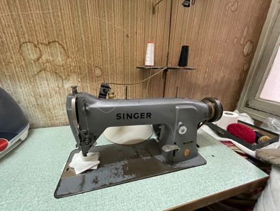 null 
SINGER: Sewing machine.

(In the laundry room, 2nd floor).
