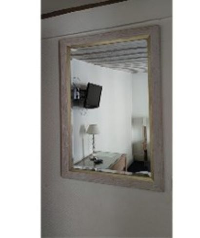 Rectangular mirror in wood and gilded, bevelled...