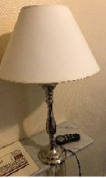 null Baluster lamp in silver plated metal 

H. 45 cm. 

Price 109