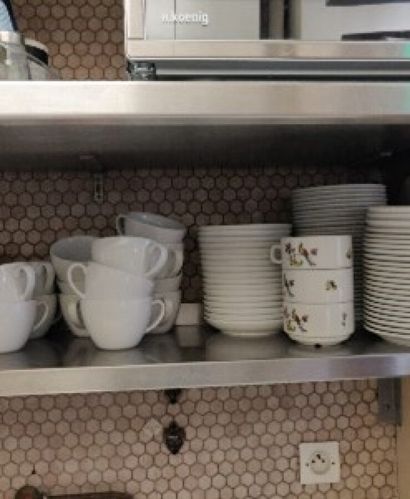 null Set of breakfast dishes including:

Water pot

Cups

Mugs

Etc.