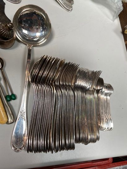 null A set of silver plated cutlery, kettledrums, serving utensils, tea strainers.

A...