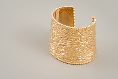 null 129. VAN CLEEF & ARPELS :

Bracelet manchette d'inspiration étrusque en or

jaune...