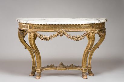 null 201. Carved and gilded wood half-moon console supported

by four curved legs...
