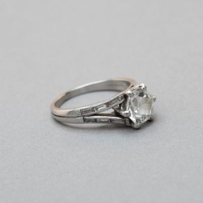 null 118. A 950/1000th platinum ring set with an old-cut diamond

diamond weighing...