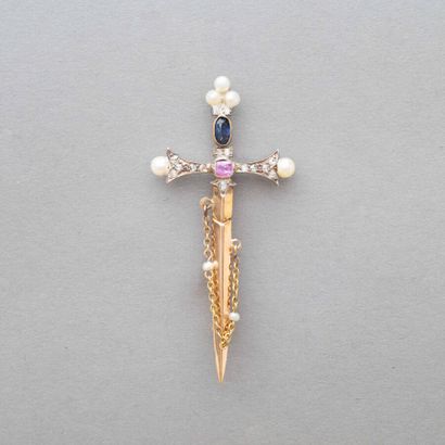 null 109. A 750/1000 (18K) yellow gold and silver sword brooch,

enhanced with a...