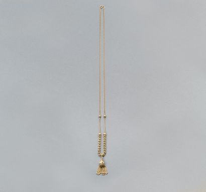 null 125. 750/1000 yellow gold necklace with pendant.

Weight : 19,7g