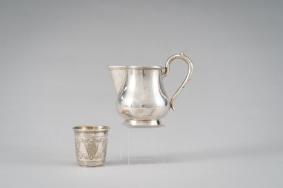 null Silver lot (875/1000th) comprising a baluster-shaped creamer resting on a base...