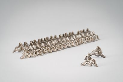 null Suite of twenty silver knife holders (950/1000th) resting on both sides on rocaille...