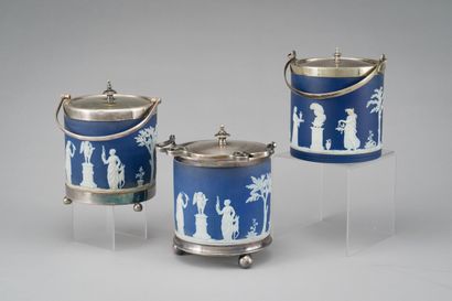 null 
WEDGWOOD:

Set of three porcelain cookie jars with vestal and love friezes...