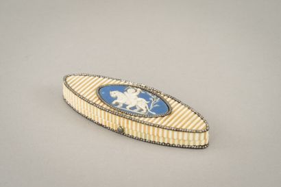 null A grooved ivory shuttle-shaped box, the lid set with a Wedgwood porcelain biscuit...