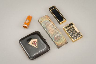 null Lot including a silver plated table lighter with caviar background signed ST...