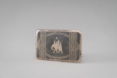 null Silver cigarette case decorated with an elephant and his mahout on one side...