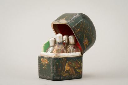 null Perfume set in silver stitched leather with polychrome painted decoration of...