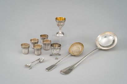 A set of silver cutlery, including : 
- a...