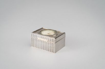 null Rectangular silver and silver-gilt box with guilloche decoration, the lid decorated...